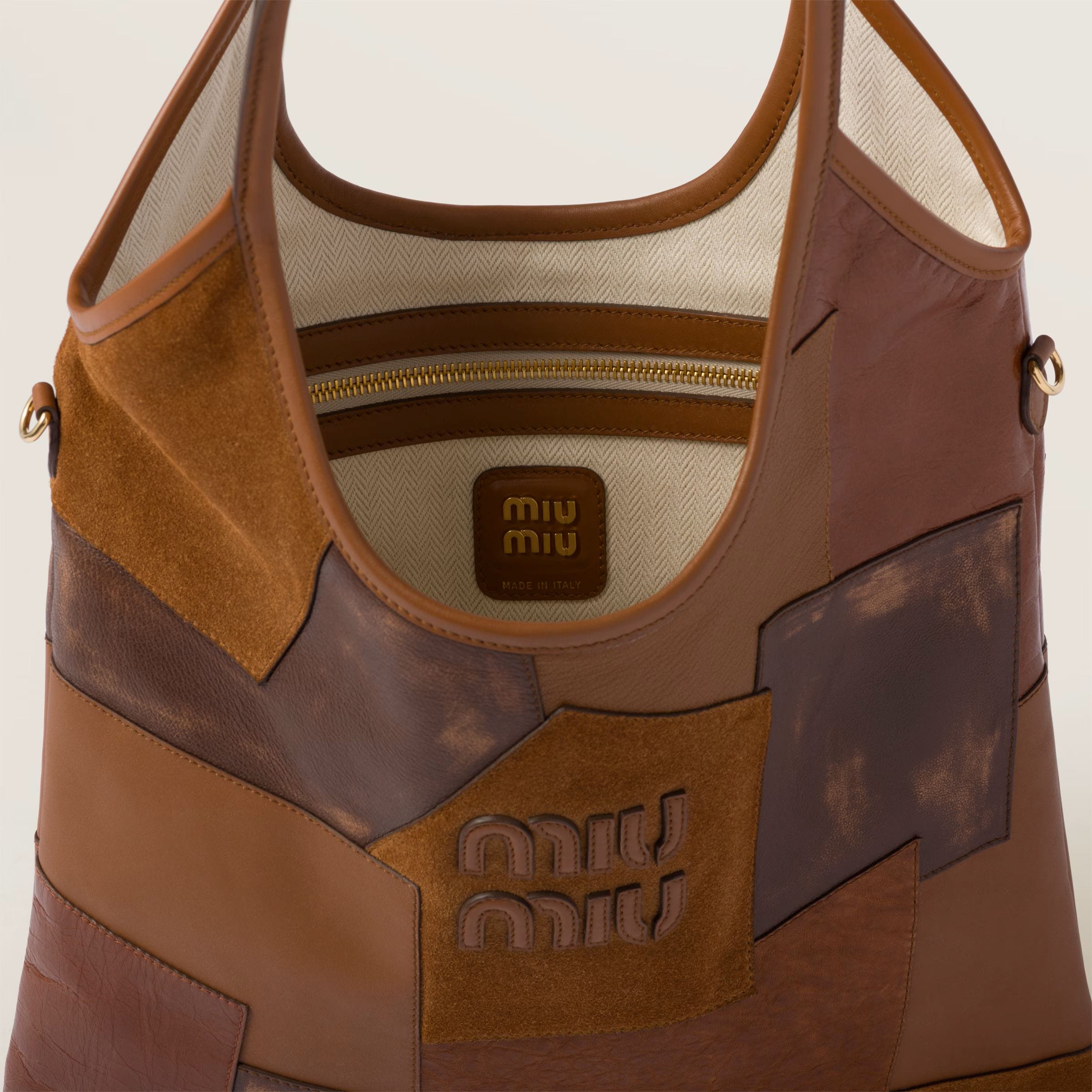 Cognac IVY leather patchwork bag, € 2450 (approximately P156,084.60), MIU MIU, miumiu.com